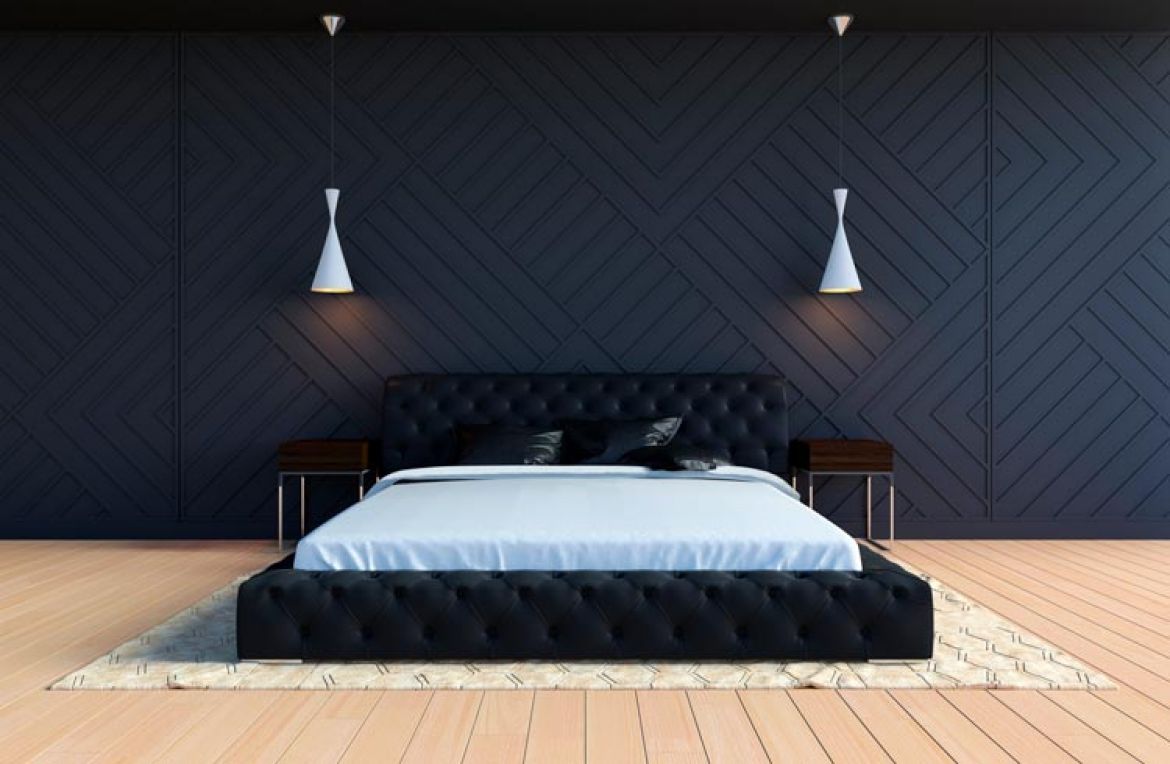 bed with black upholstered headboard